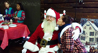 Citizen gets photo with Santa at 2015 Holiday Market